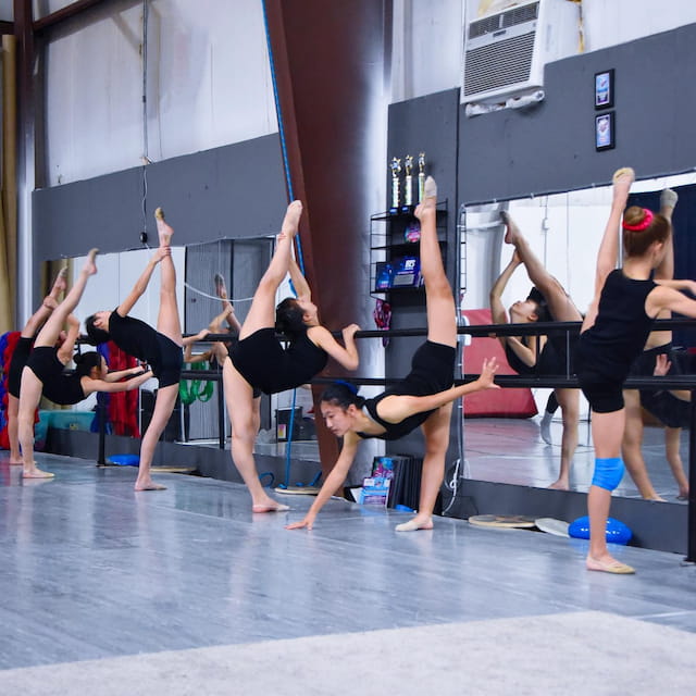 a group of women doing yoga
