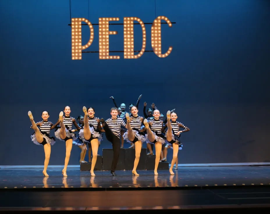 a group of women on a stage