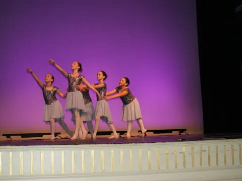 a group of women on a stage