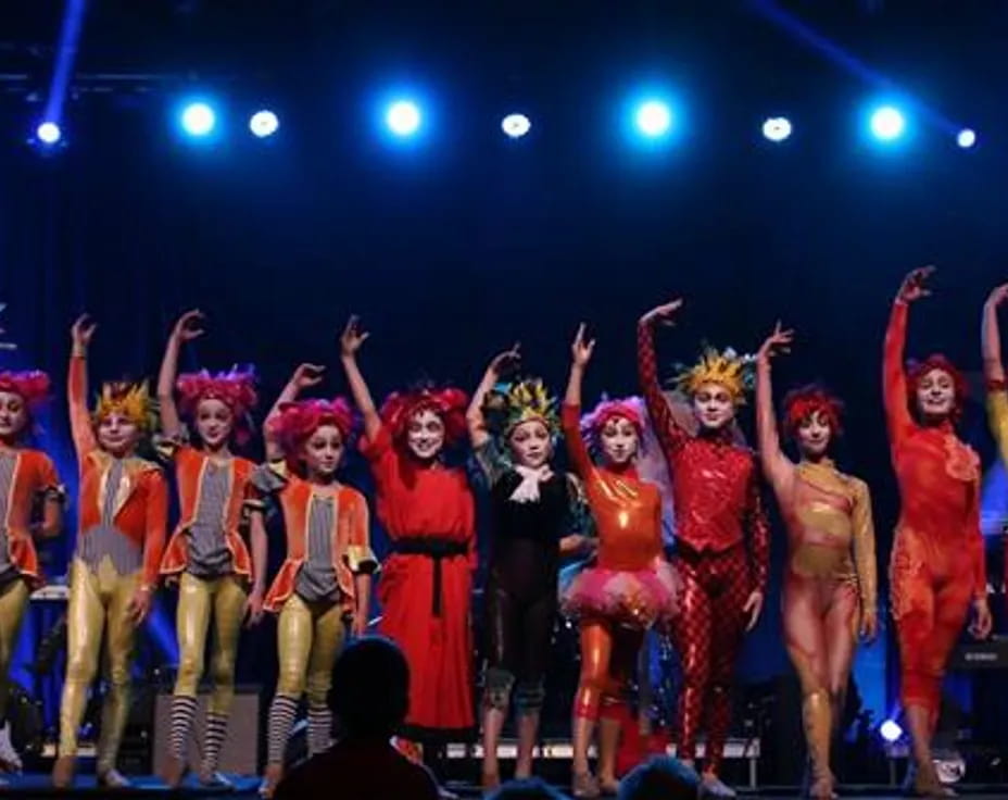 a group of people on a stage
