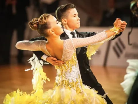 a man and woman dancing