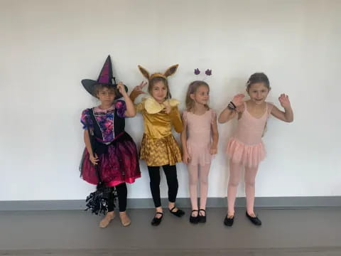 a group of women wearing clothing