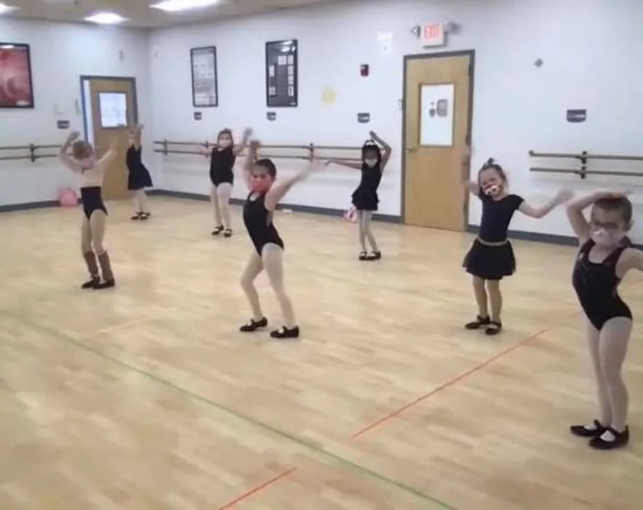 a group of girls in a gym