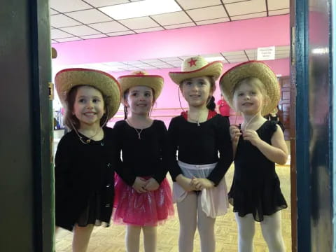 a group of girls wearing hats