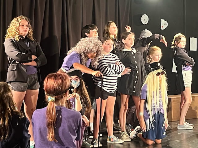 a group of people on a stage