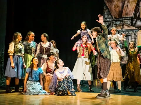 a group of people on a stage