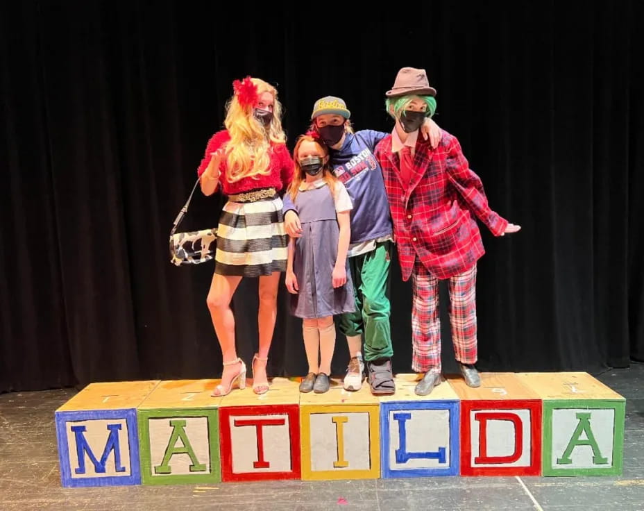 a group of people on a stage