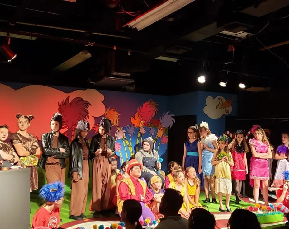 a group of people on a stage