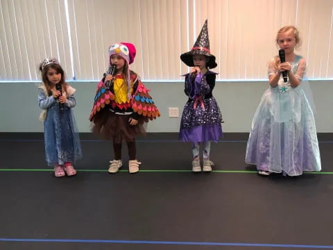 a group of girls on a stage