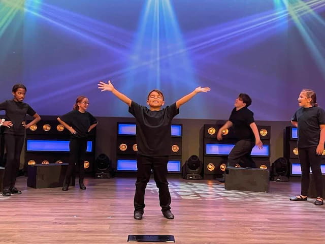 a group of people on a stage