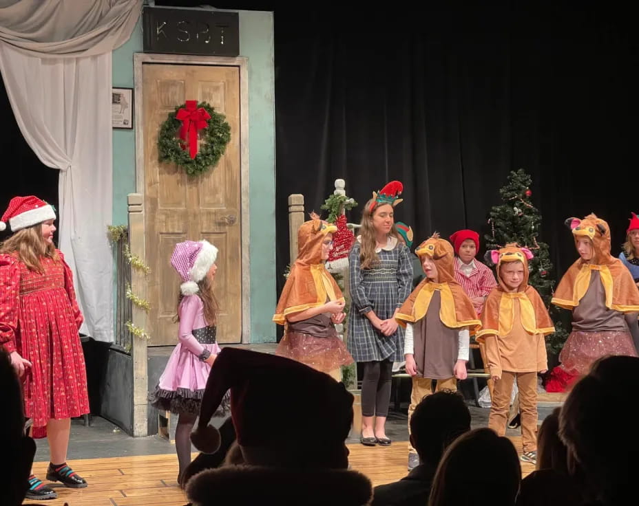 a group of children on a stage