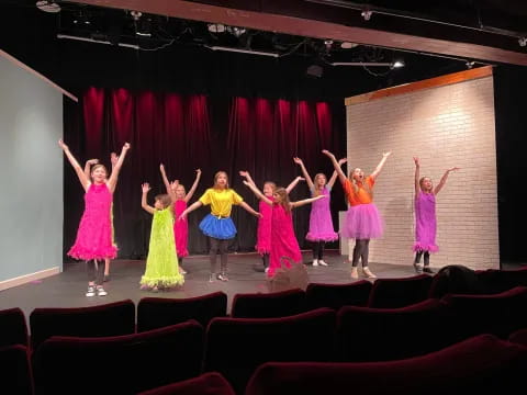 a group of girls in a performance