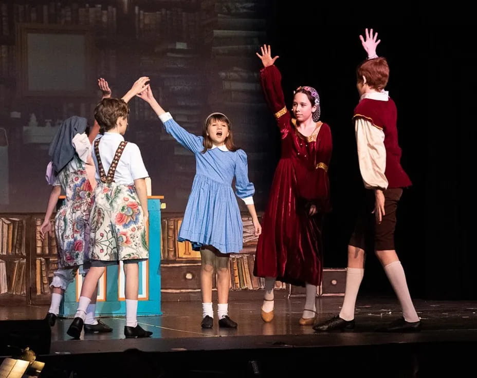 a group of people on a stage