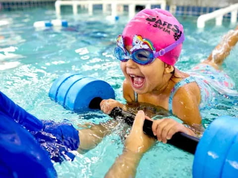 a child in a pool