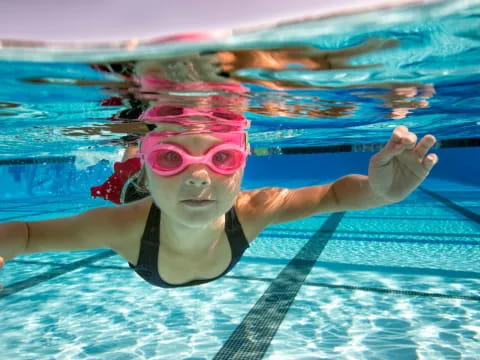 a woman in a pool
