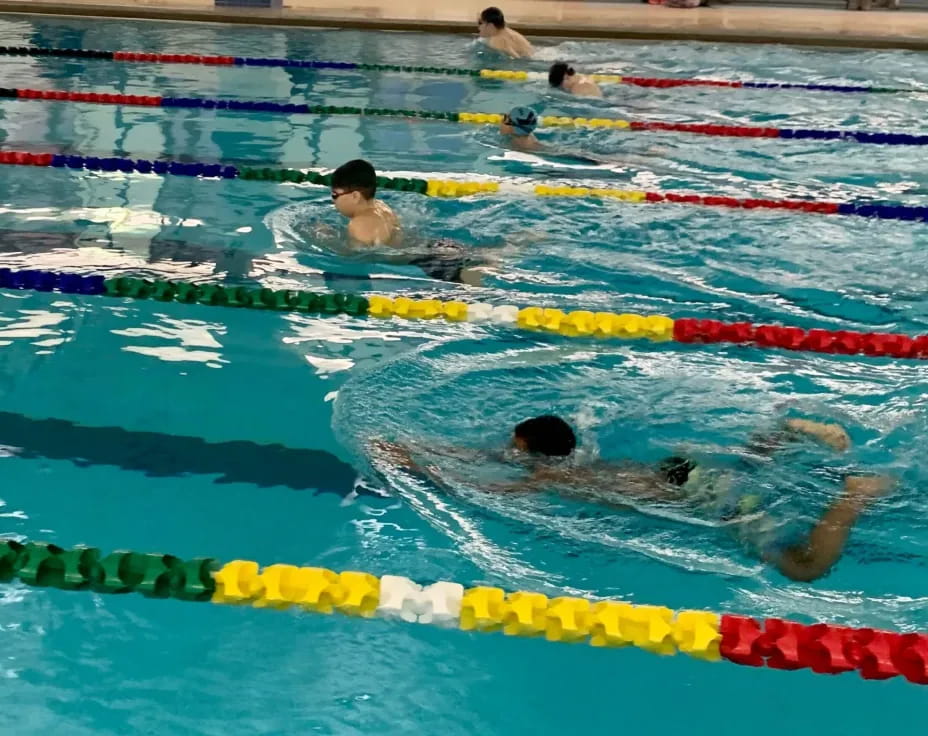 a group of people in a pool