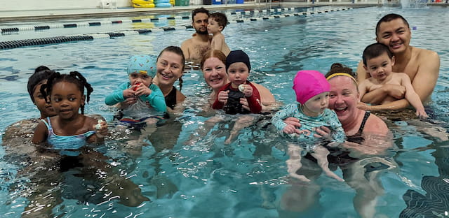 a group of people in a pool