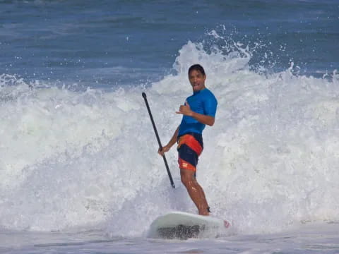 a man surfing on the waves