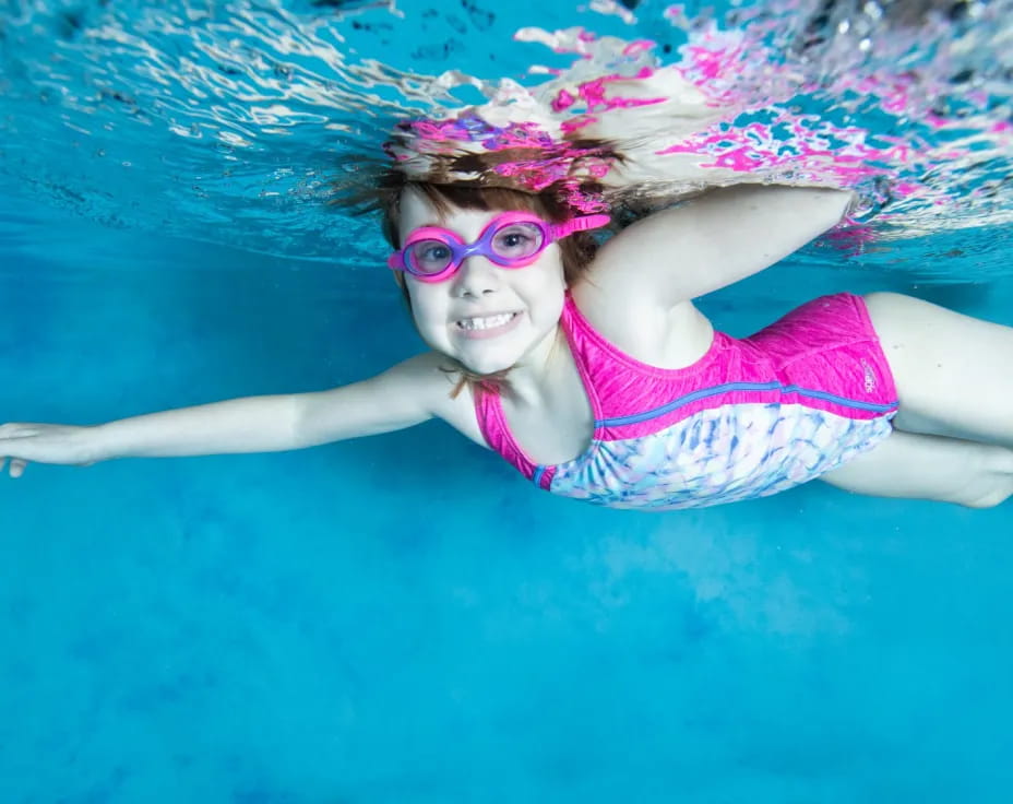 a person swimming in a pool