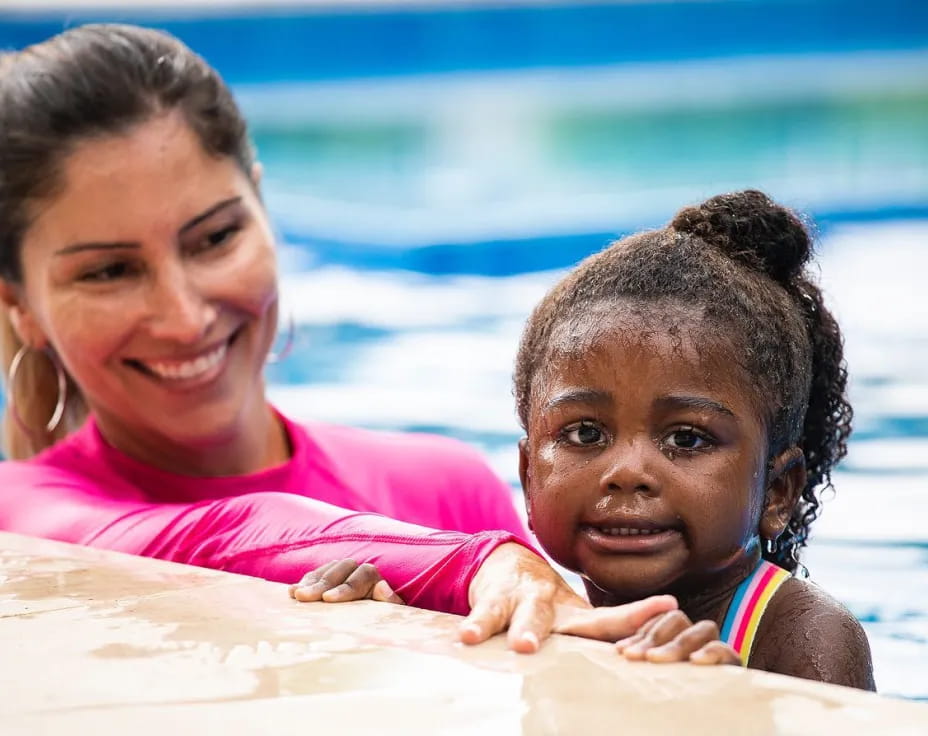 a person and a child in the water
