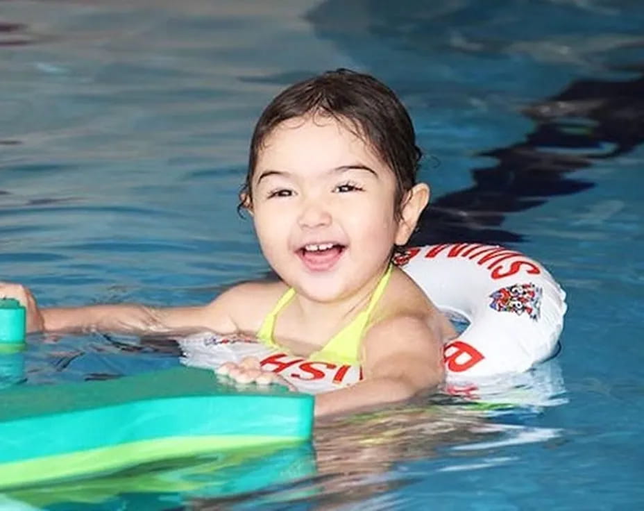 a child in a pool