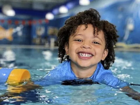 a child in a pool
