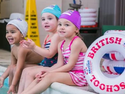 a group of kids in a pool