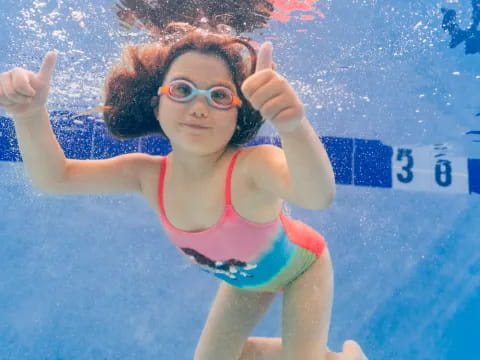 a girl in a pool