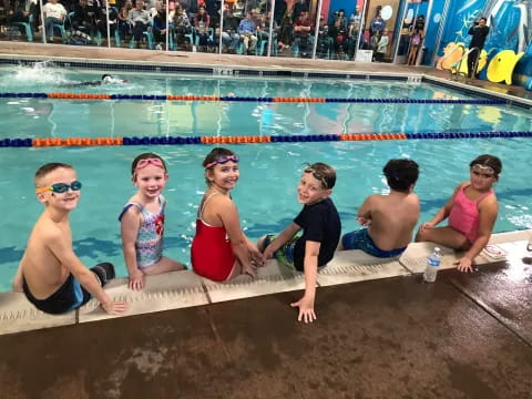a group of people in a pool