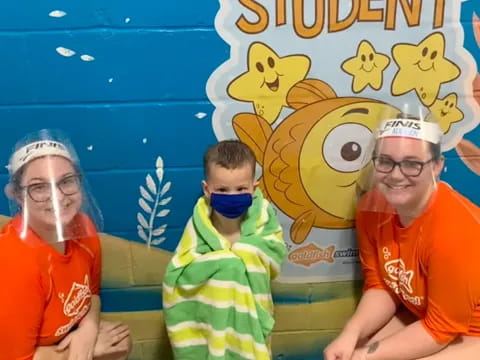 a group of people wearing masks