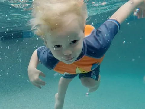 a child in a pool