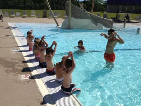 a group of people in a pool