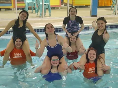 a group of people in a pool