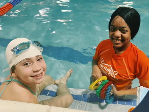 a man and woman in a pool