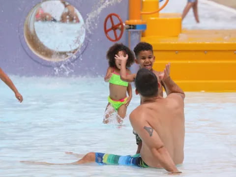 a group of people in a pool