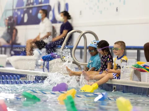 a group of kids in a pool