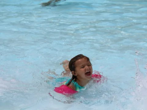 a person swimming in the water