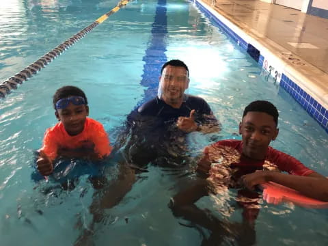 a group of people in a pool