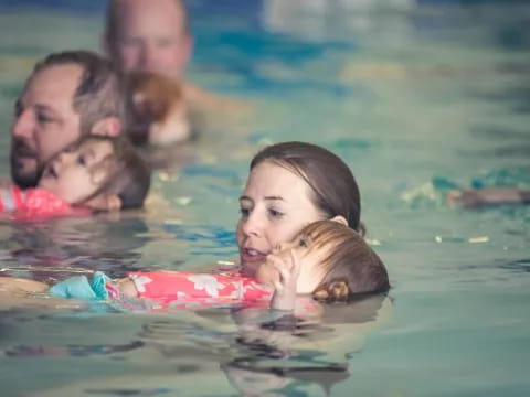 a group of people in the water