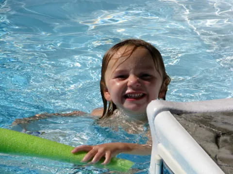 a girl in a pool