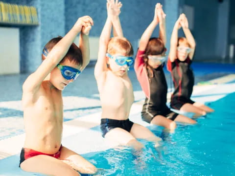 a group of people in a pool