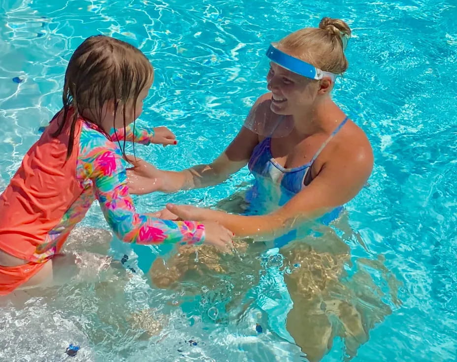 a person and a child in the water