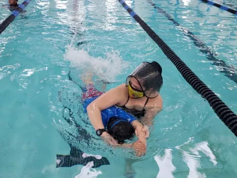 a person in a pool