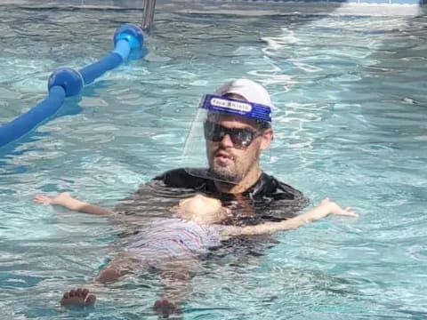 a man in a pool