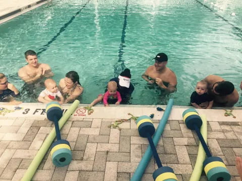 a group of people in a pool