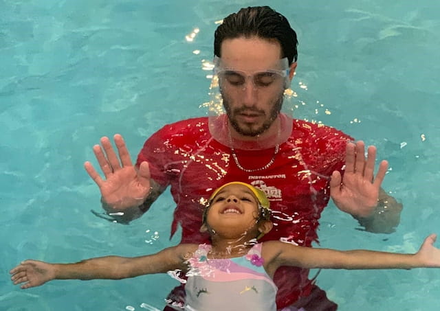 a man and a woman in a pool of water