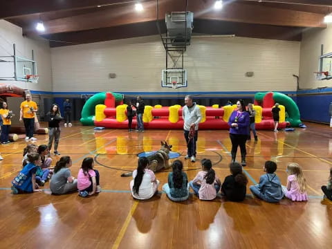a group of people in a gym