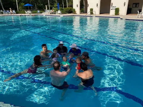 a group of people in a pool