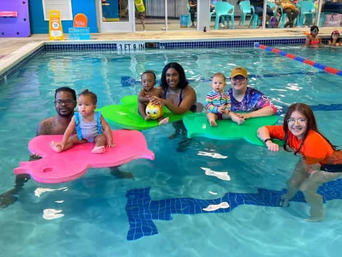 a group of people in a pool