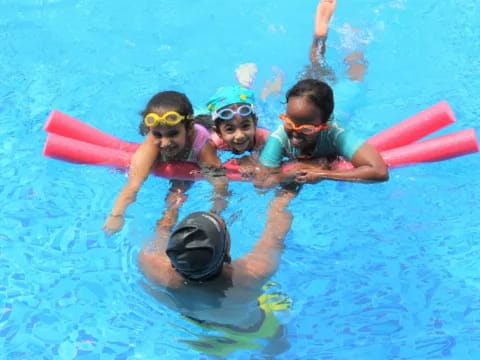 a group of people in a pool